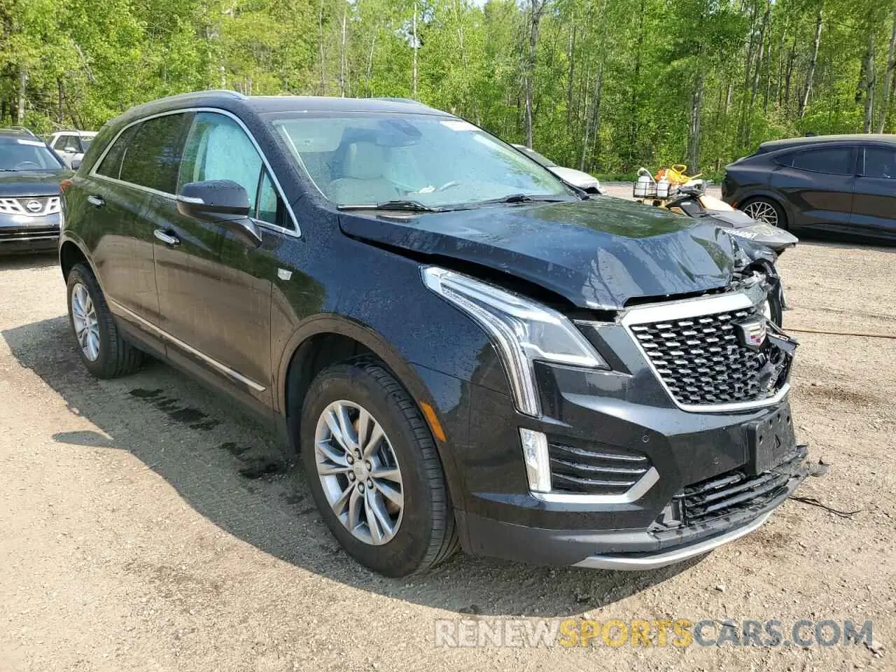 4 Photograph of a damaged car 1GYKNDR47NZ111097 CADILLAC XT5 2022