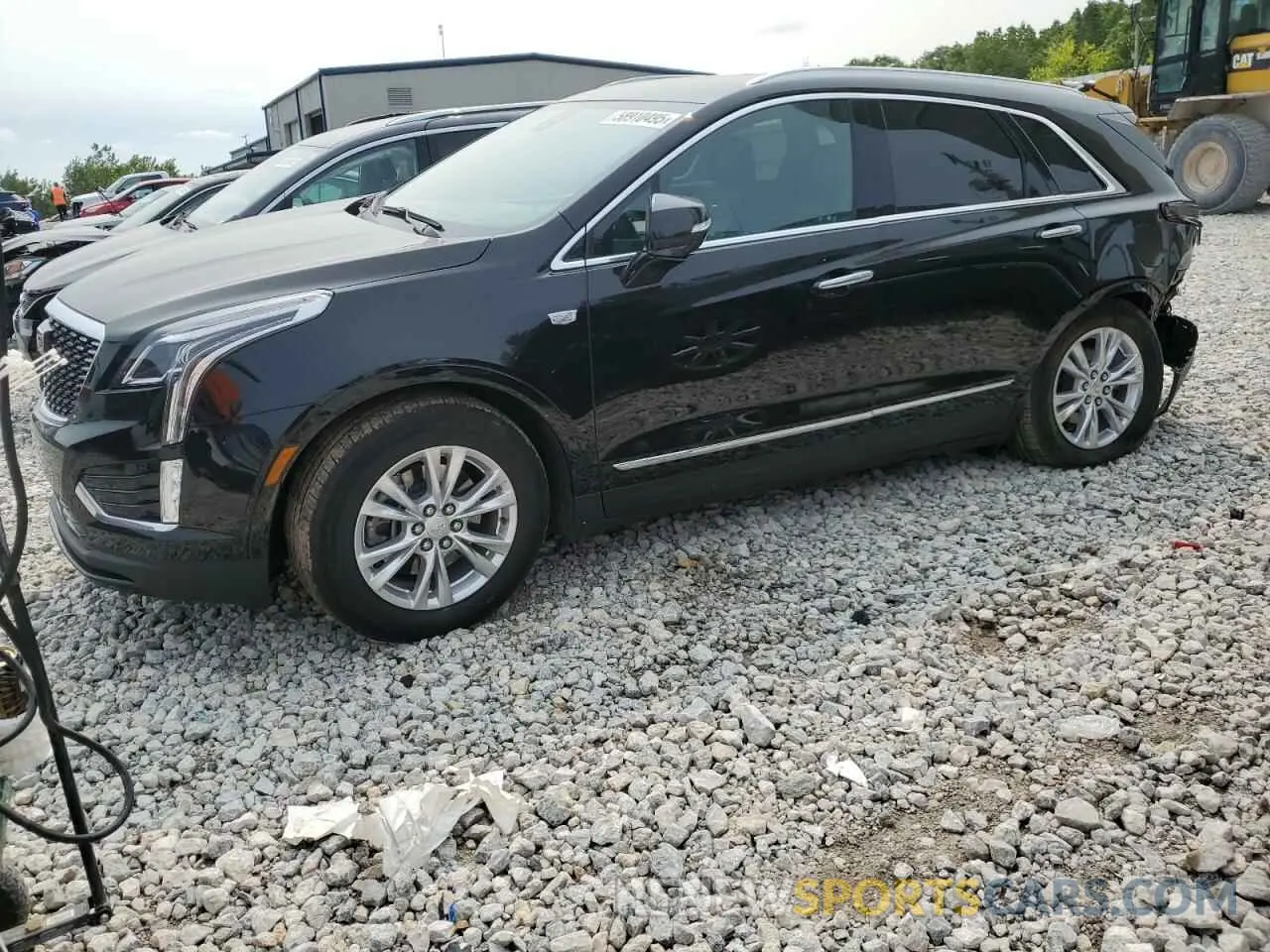 1 Photograph of a damaged car 1GYKNBR4XPZ116978 CADILLAC XT5 2023