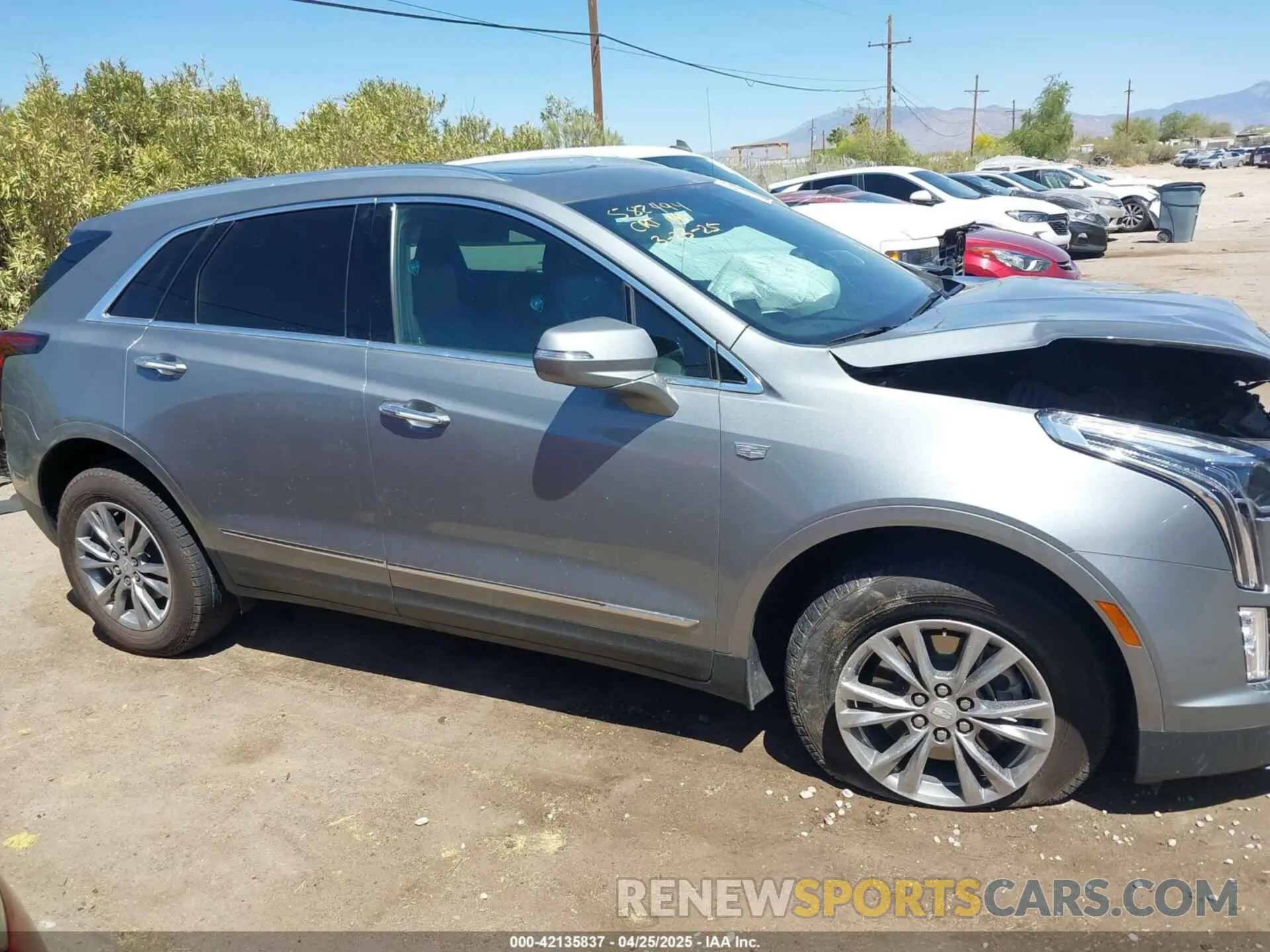 12 Photograph of a damaged car 1GYKNCRS3PZ143699 CADILLAC XT5 2023