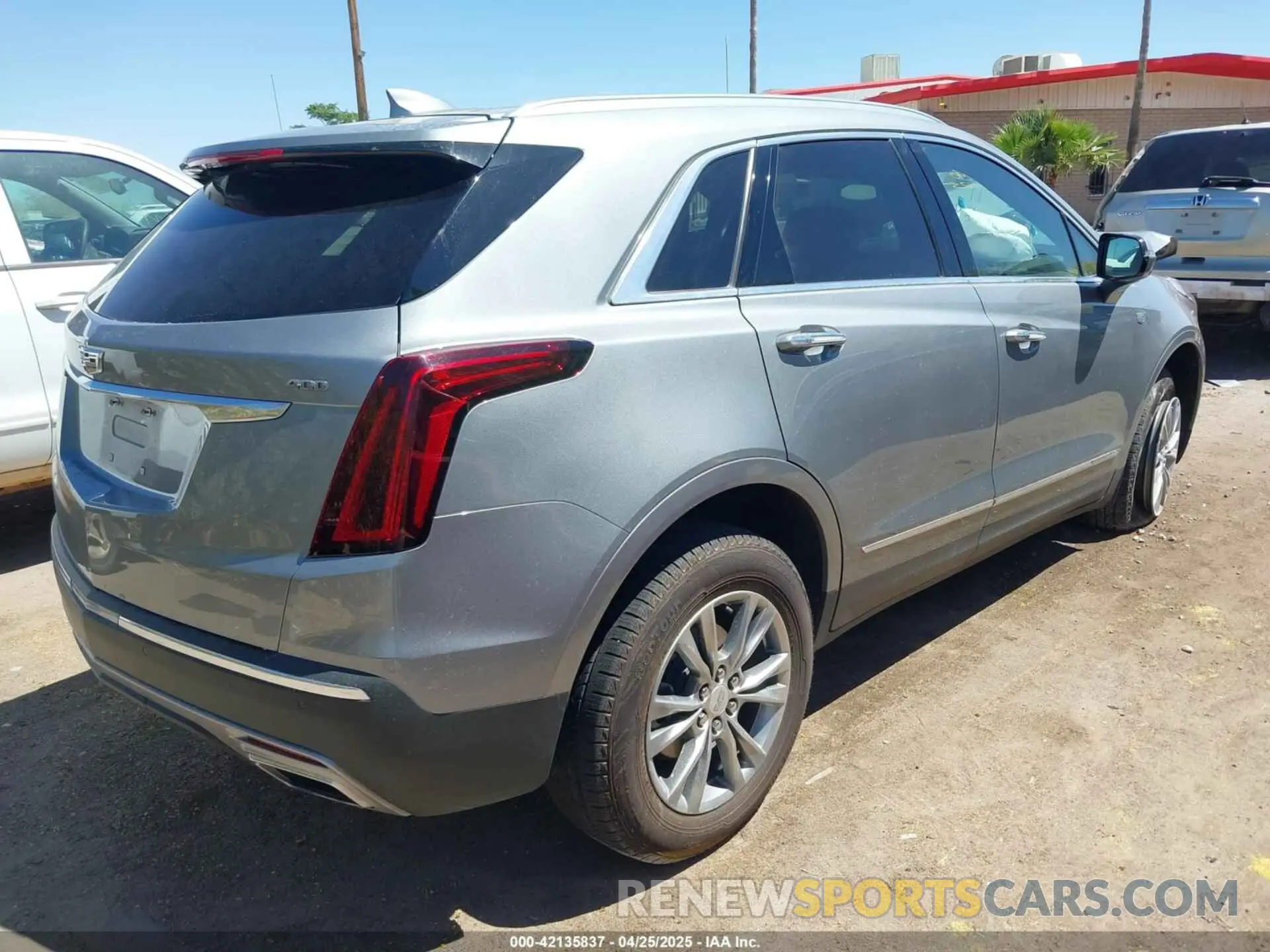 4 Photograph of a damaged car 1GYKNCRS3PZ143699 CADILLAC XT5 2023