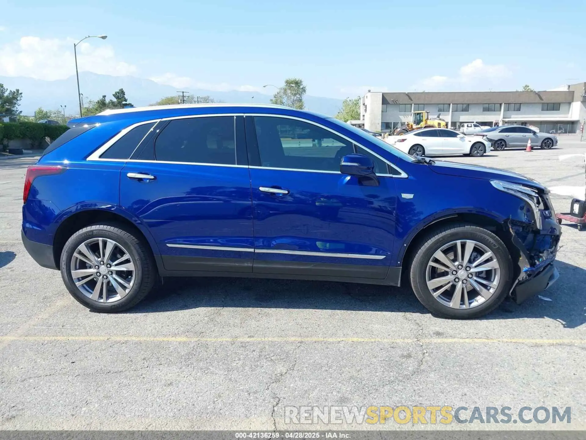 14 Photograph of a damaged car 1GYKNCRS3PZ176654 CADILLAC XT5 2023