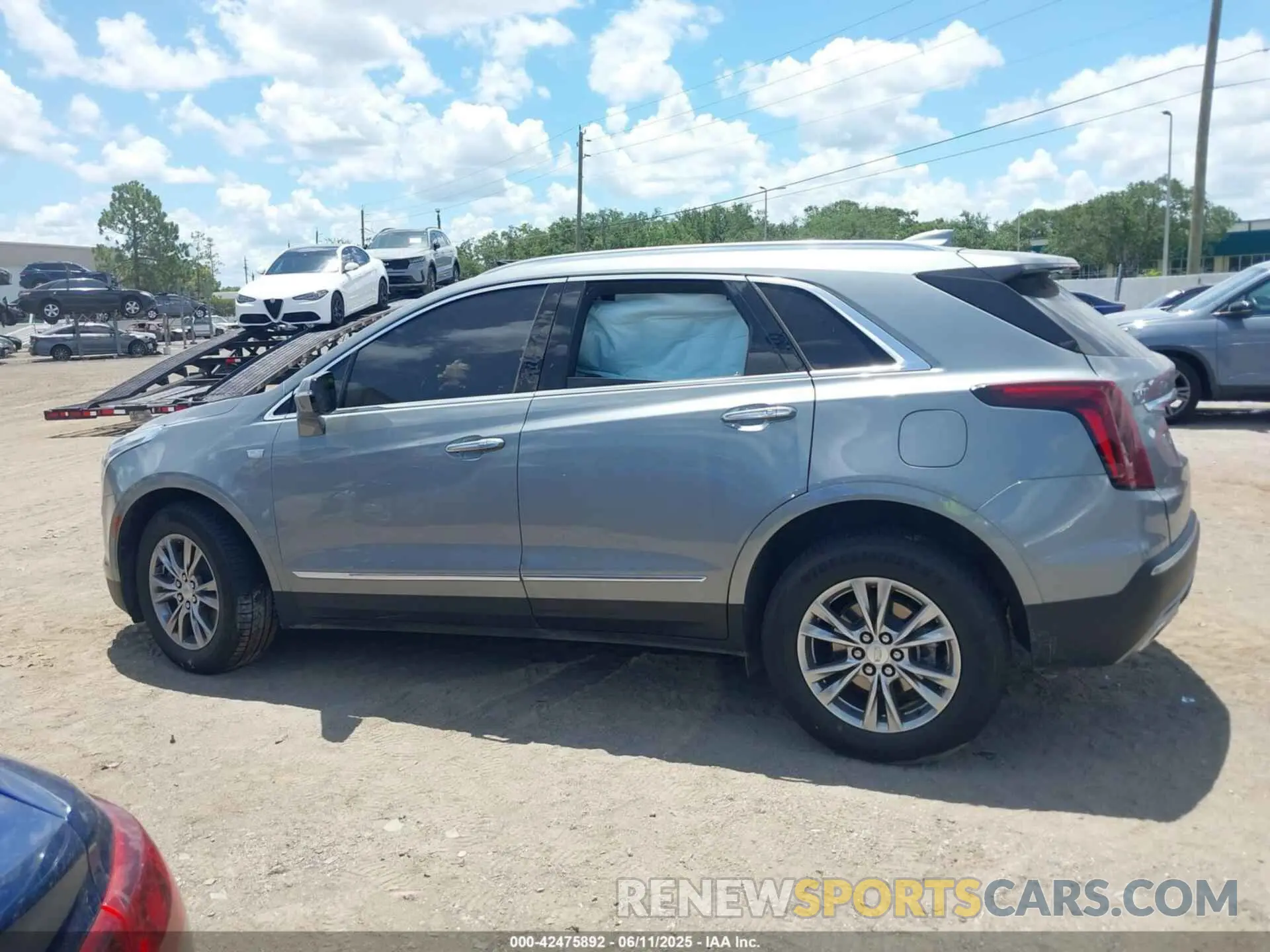 13 Photograph of a damaged car 1GYKNCRS6PZ151361 CADILLAC XT5 2023