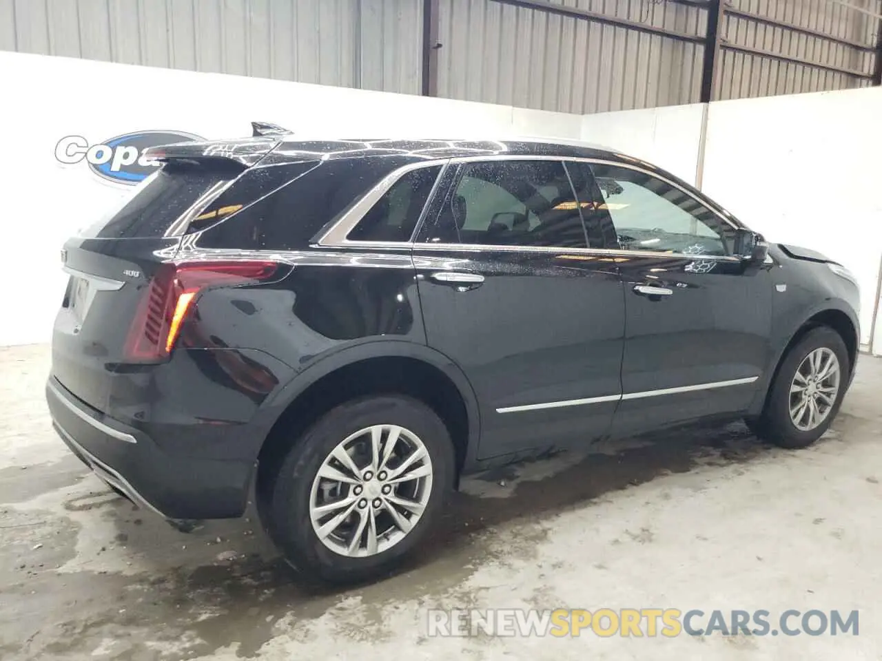3 Photograph of a damaged car 1GYKNCRS6PZ171335 CADILLAC XT5 2023