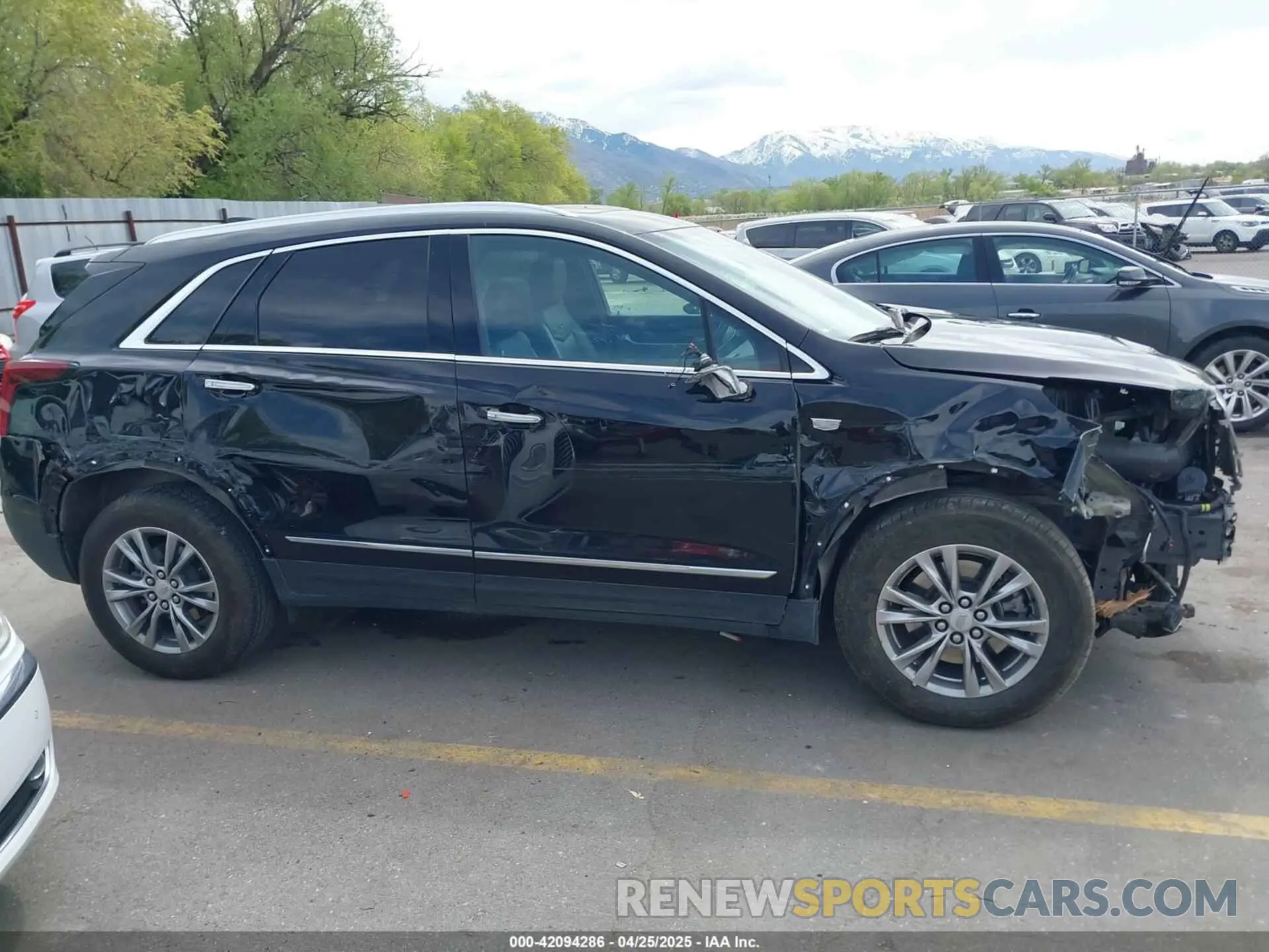 14 Photograph of a damaged car 1GYKNDRS2PZ207186 CADILLAC XT5 2023