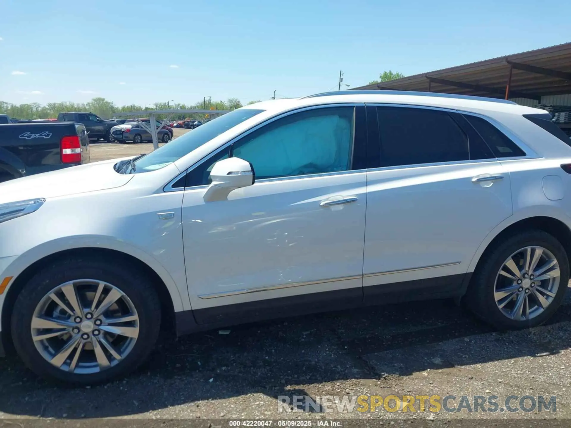 14 Photograph of a damaged car 1GYKNDRS5RZ707748 CADILLAC XT5 2024