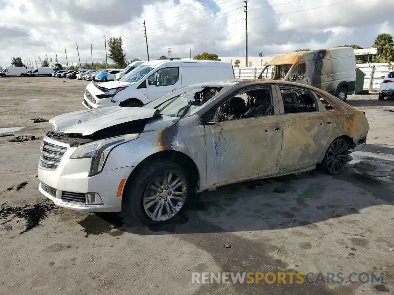 1 Photograph of a damaged car 2G61M5S33K9109318 CADILLAC XTS 2019