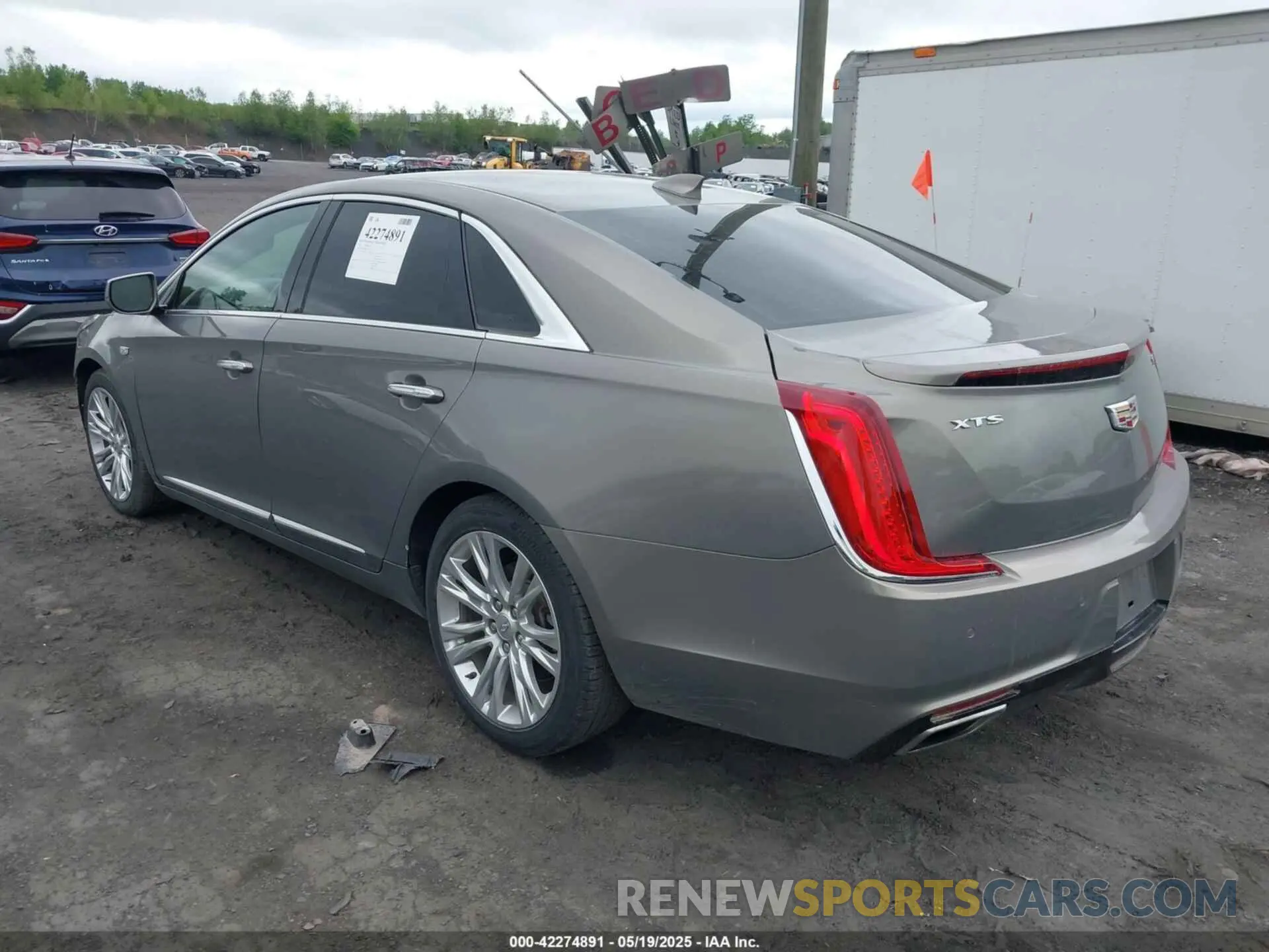 3 Photograph of a damaged car 2G61M5S34K9136818 CADILLAC XTS 2019