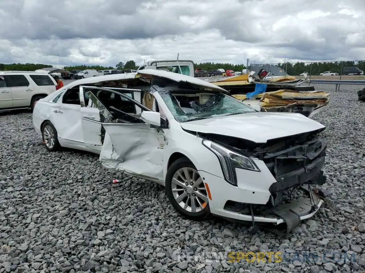 4 Photograph of a damaged car 2GEXG6U32K9550205 CADILLAC XTS 2019