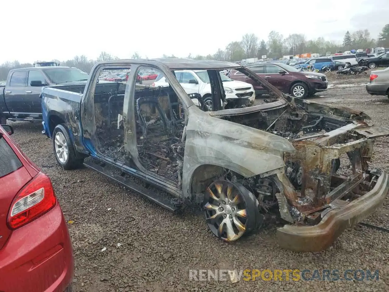 4 Photograph of a damaged car 1GCPDBEK1NZ587403 CHEVROLET ALL Models 2022