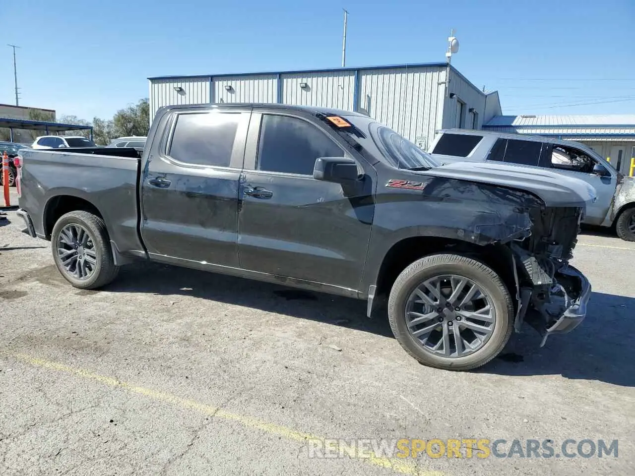 4 Photograph of a damaged car 1GCUDEEL8NZ534534 CHEVROLET ALL Models 2022