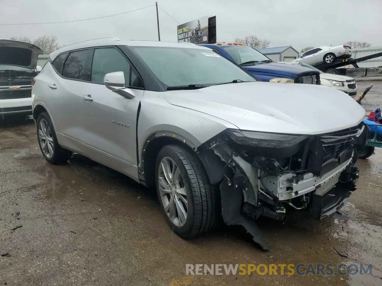 4 Photograph of a damaged car 3GNKBKRSXKS577401 CHEVROLET BLAZER 2019