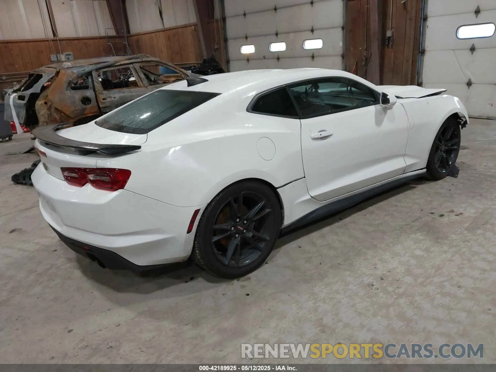 4 Photograph of a damaged car 1G1FB1RX7M0128230 CHEVROLET CAMARO 2021