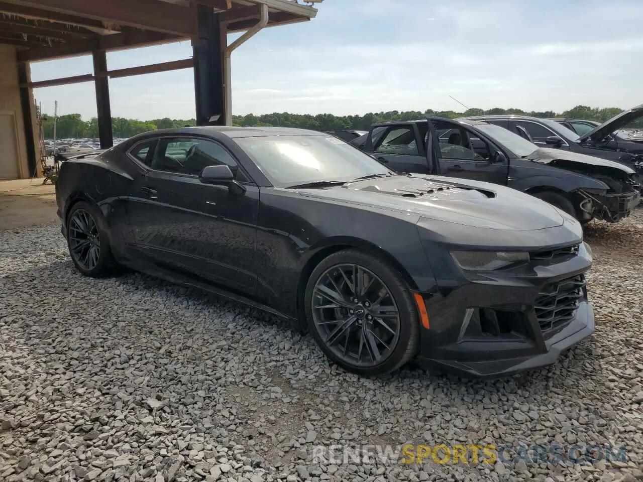 4 Photograph of a damaged car 1G1FJ1R61N0106977 CHEVROLET CAMARO 2022