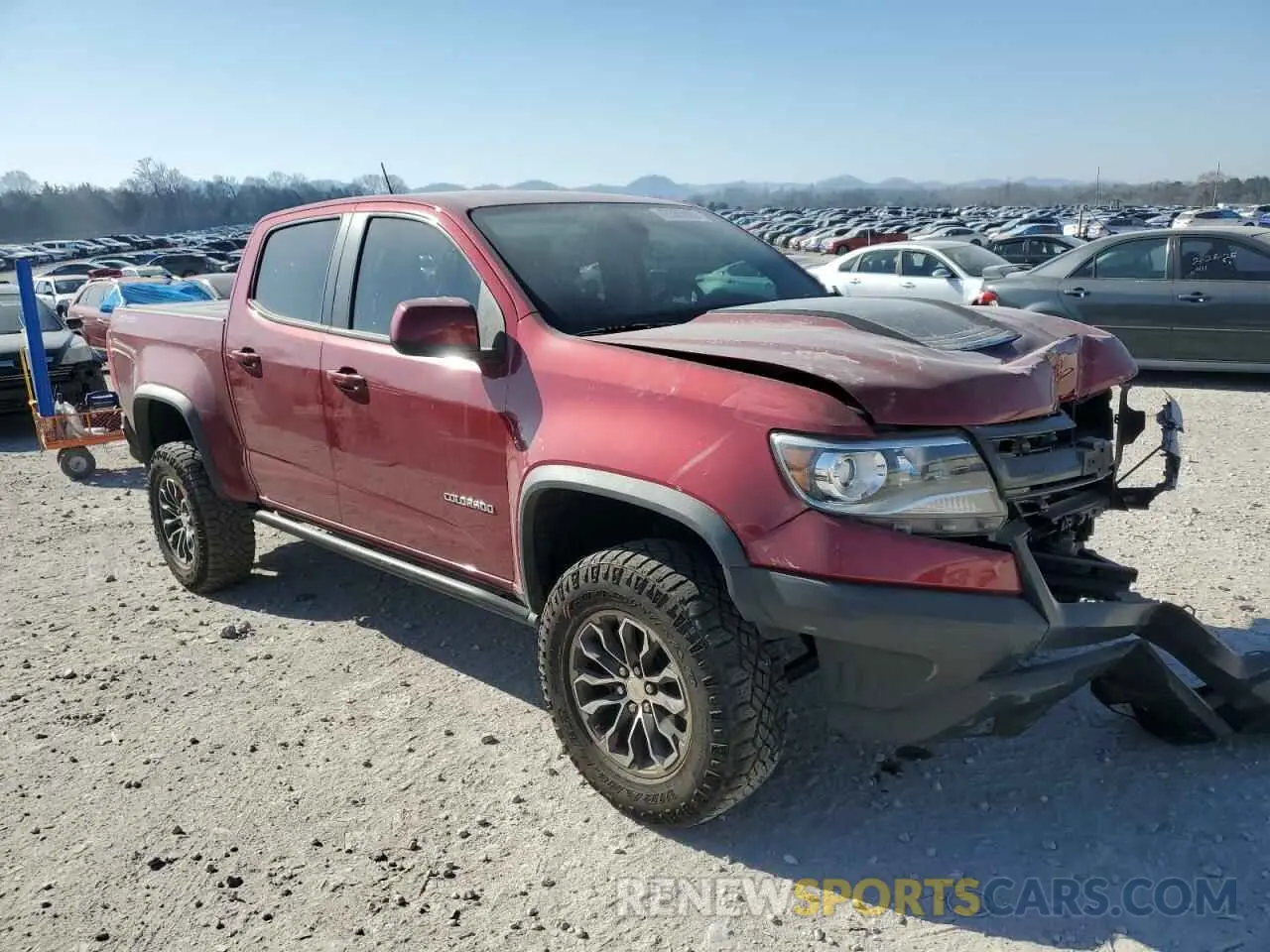 4 Photograph of a damaged car 1GCGTEEN2K1351058 CHEVROLET COLORADO 2019