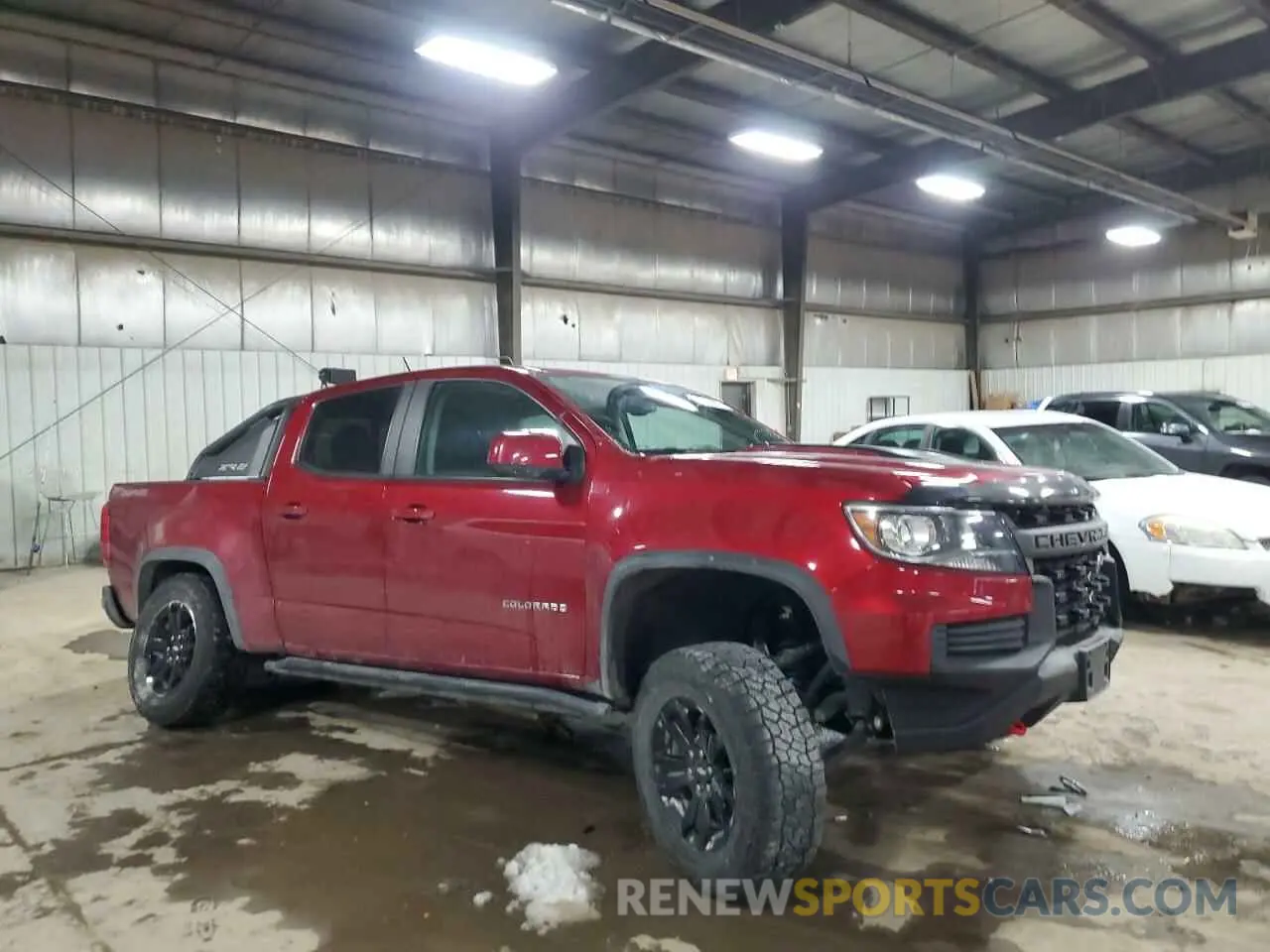 4 Photograph of a damaged car 1GCGTEEN1M1112569 CHEVROLET COLORADO 2021
