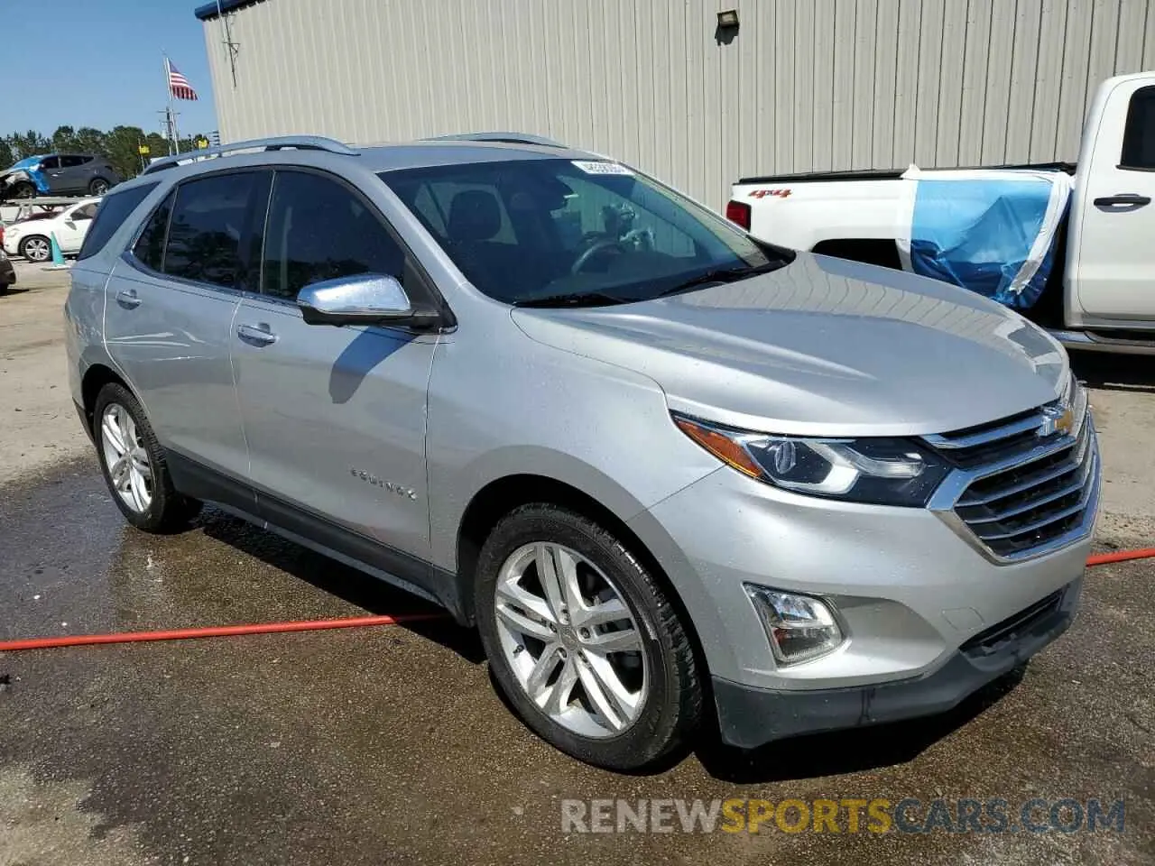 4 Photograph of a damaged car 3GNAXPEX5LS567453 CHEVROLET EQUINOX 2020