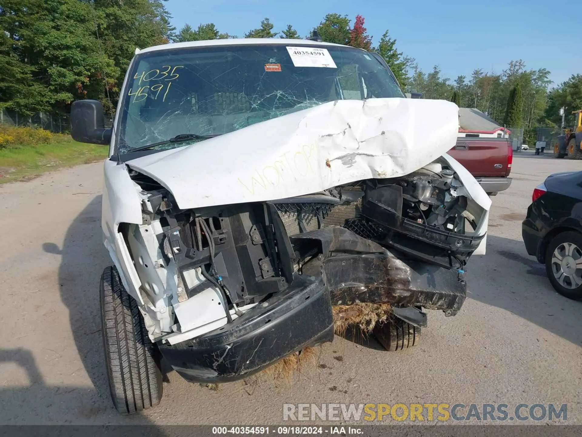 12 Photograph of a damaged car 1GCWGAFG8L1263027 CHEVROLET EXPRESS CARGO 2020