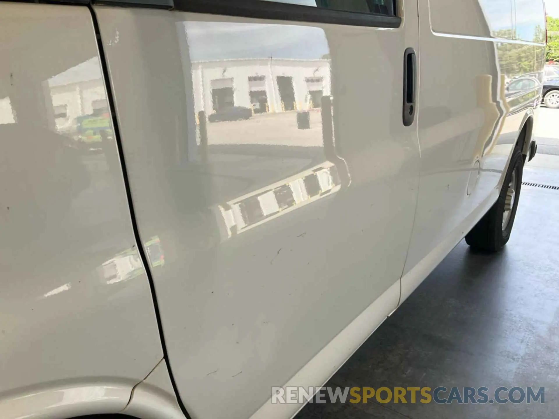 13 Photograph of a damaged car 1GCWGAFP4M1311981 CHEVROLET EXPRESS G2500 2021