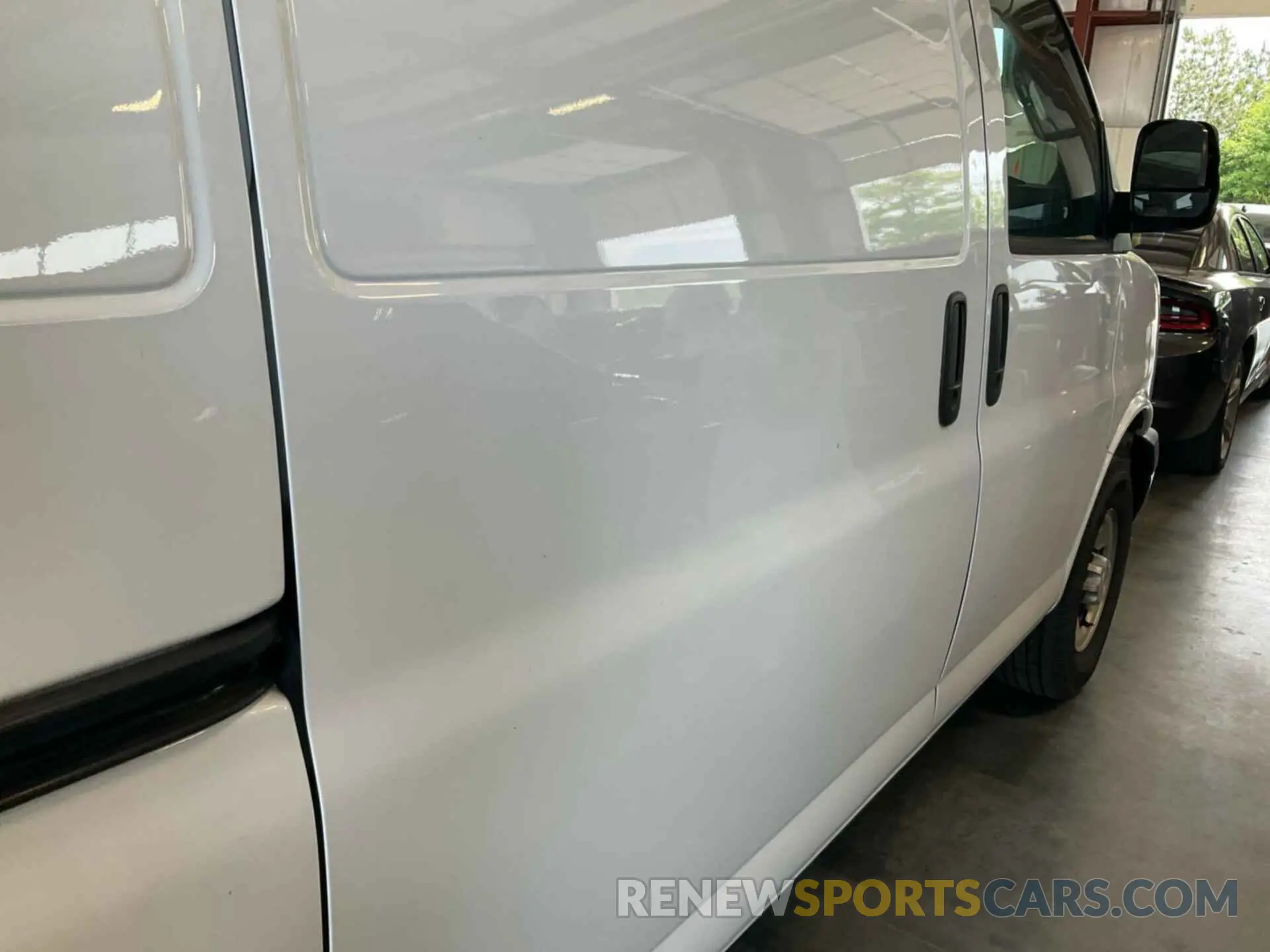18 Photograph of a damaged car 1GCWGAFP4M1311981 CHEVROLET EXPRESS G2500 2021