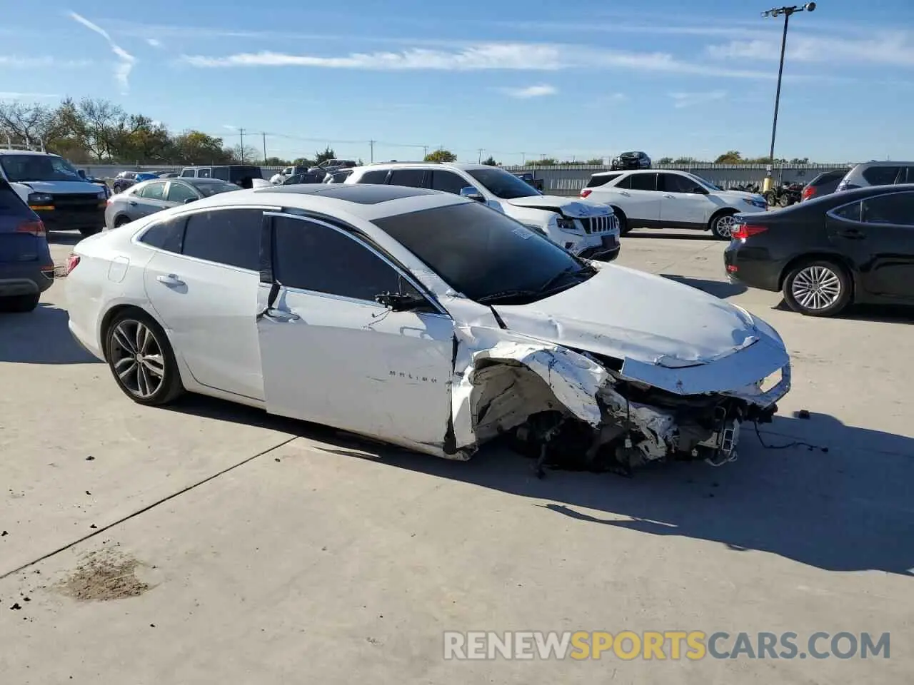 4 Photograph of a damaged car 1G1ZE5SX9LF051121 CHEVROLET MALIBU 2020