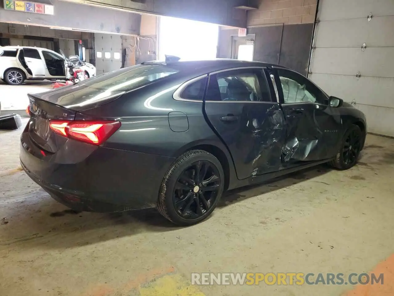3 Photograph of a damaged car 1G1ZD5ST7MF034898 CHEVROLET MALIBU 2021