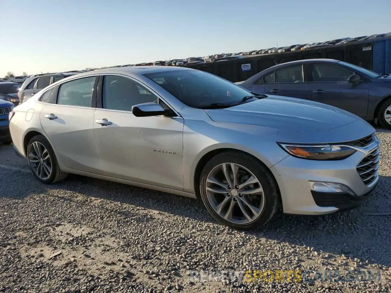 4 Photograph of a damaged car 1G1ZD5ST2NF163052 CHEVROLET MALIBU 2022