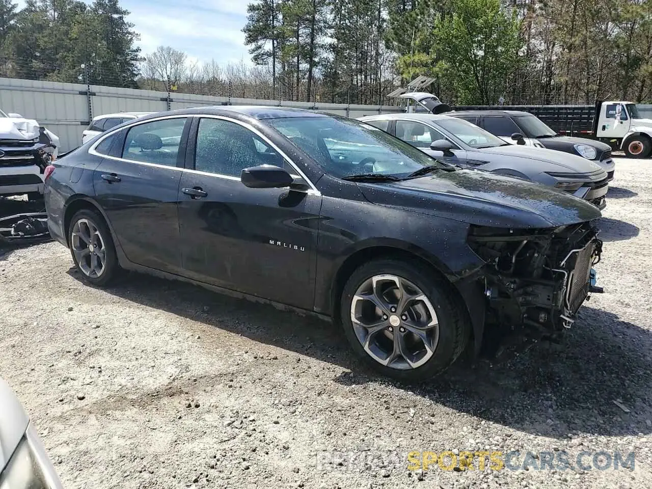 4 Photograph of a damaged car 1G1ZD5STXNF112771 CHEVROLET MALIBU 2022