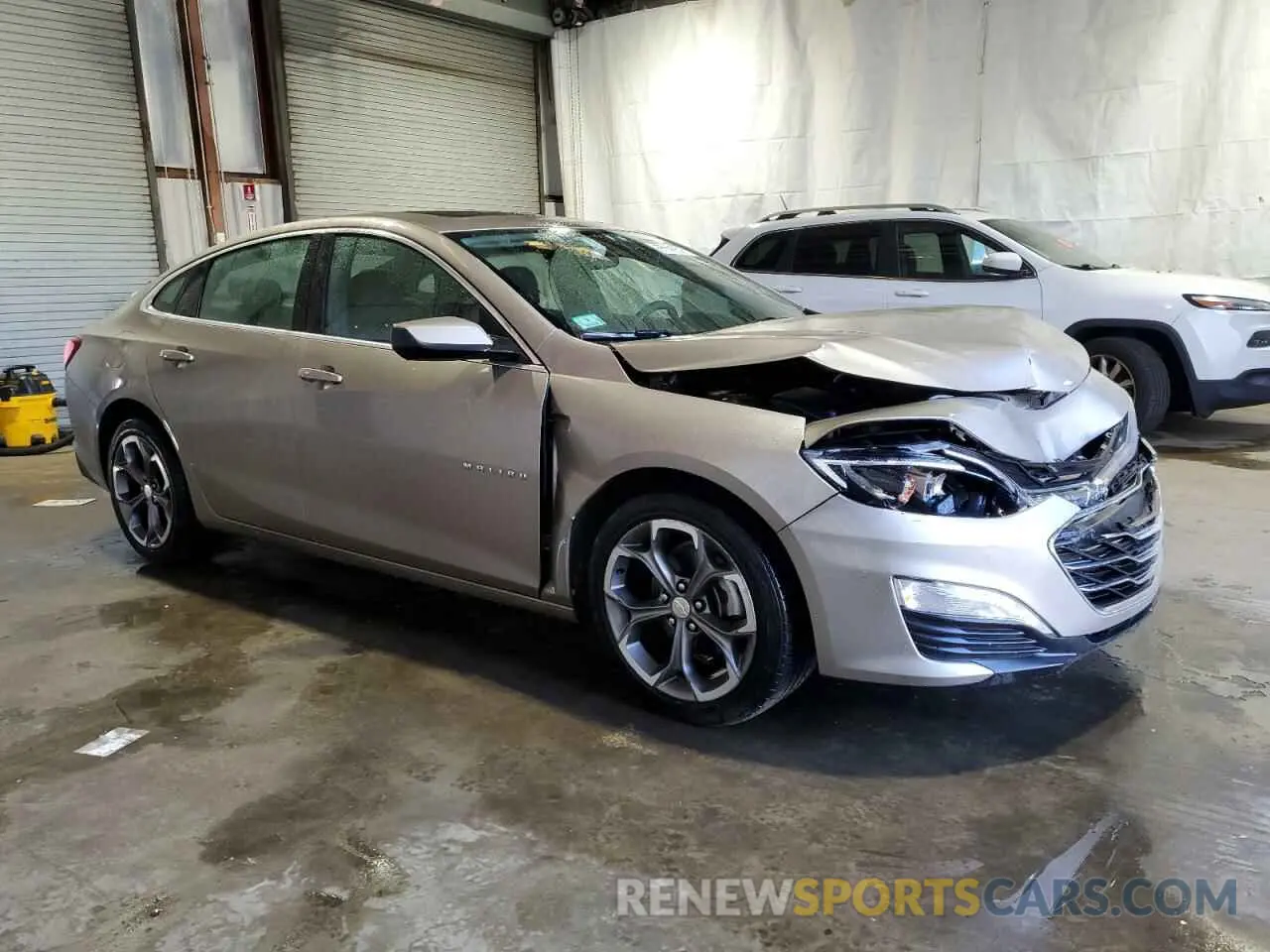 4 Photograph of a damaged car 1G1ZD5STXNF147973 CHEVROLET MALIBU 2022