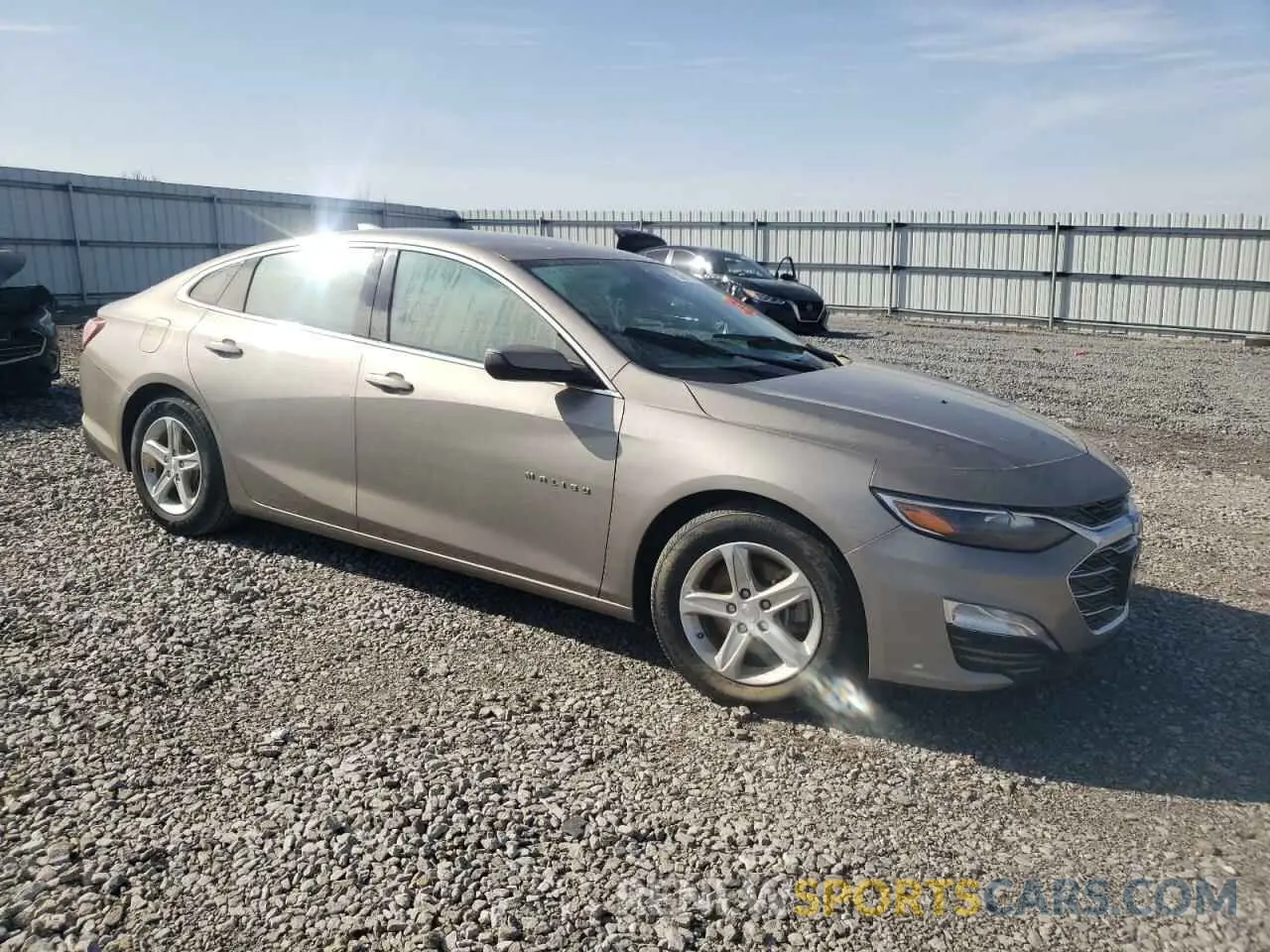 4 Photograph of a damaged car 1G1ZD5STXNF152400 CHEVROLET MALIBU 2022