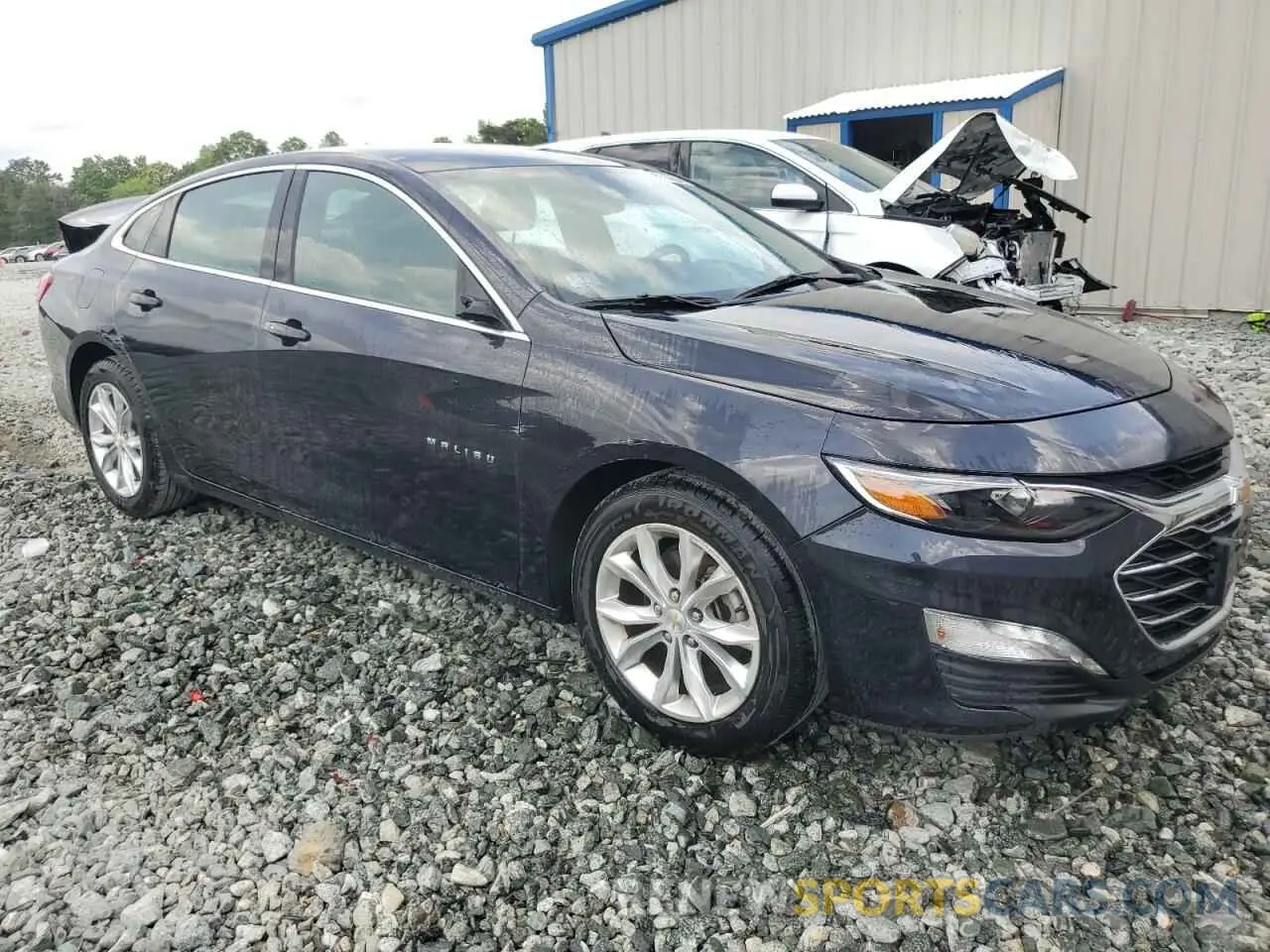 4 Photograph of a damaged car 1G1ZD5ST1PF208016 CHEVROLET MALIBU 2023