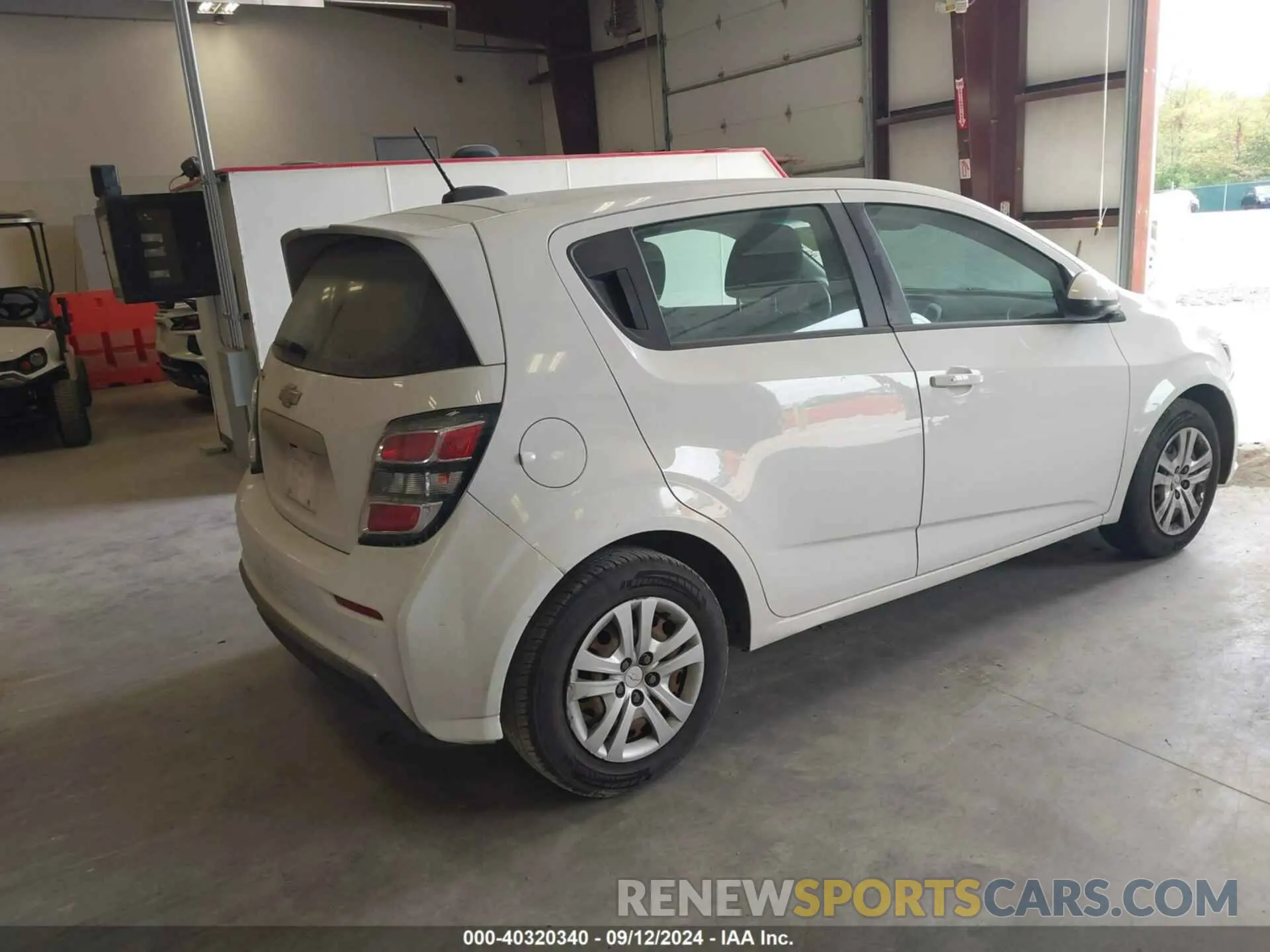 4 Photograph of a damaged car 1G1JG6SB1K4130679 CHEVROLET SONIC 2019