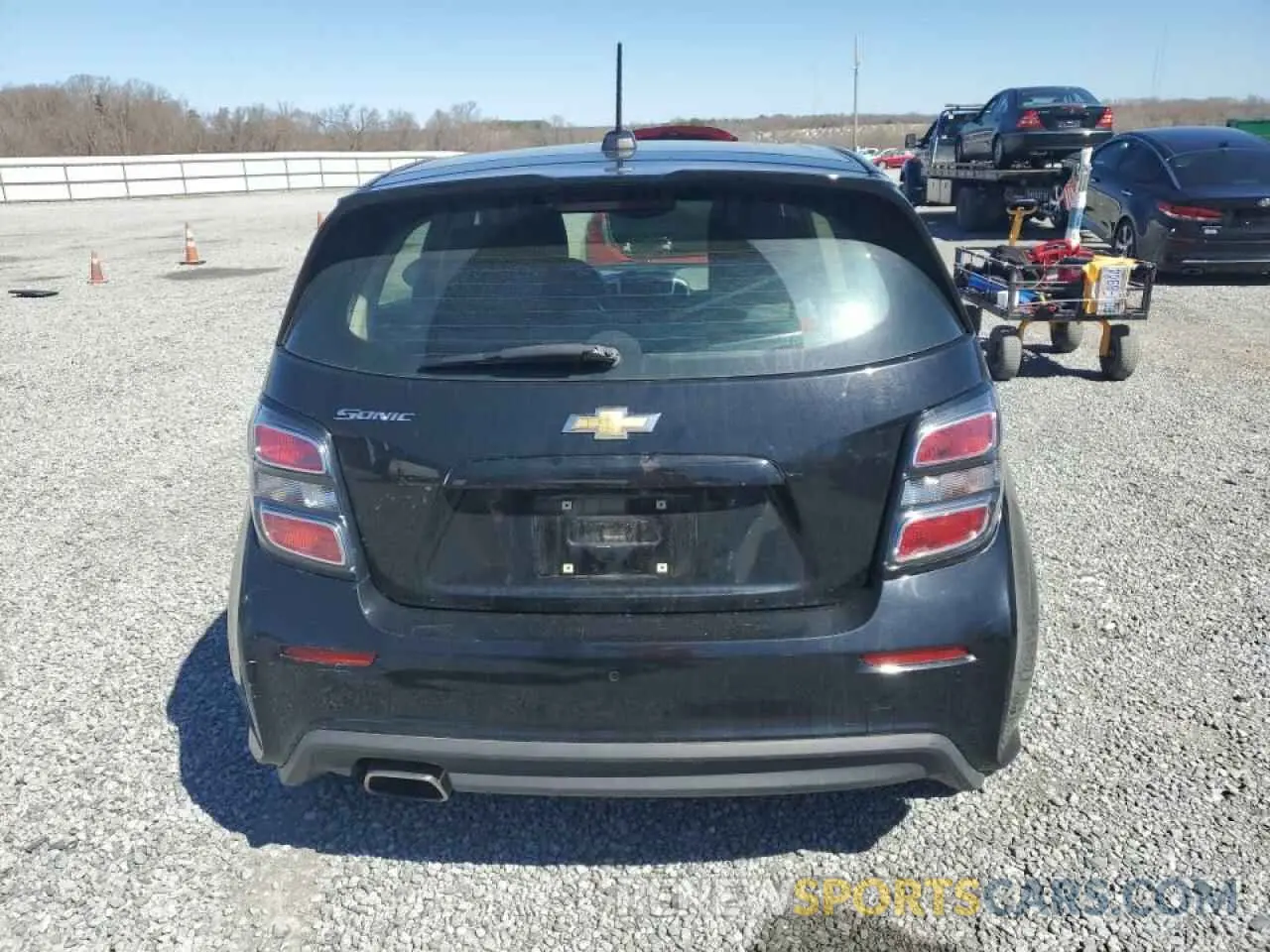 6 Photograph of a damaged car 1G1JG6SB6K4136817 CHEVROLET SONIC 2019