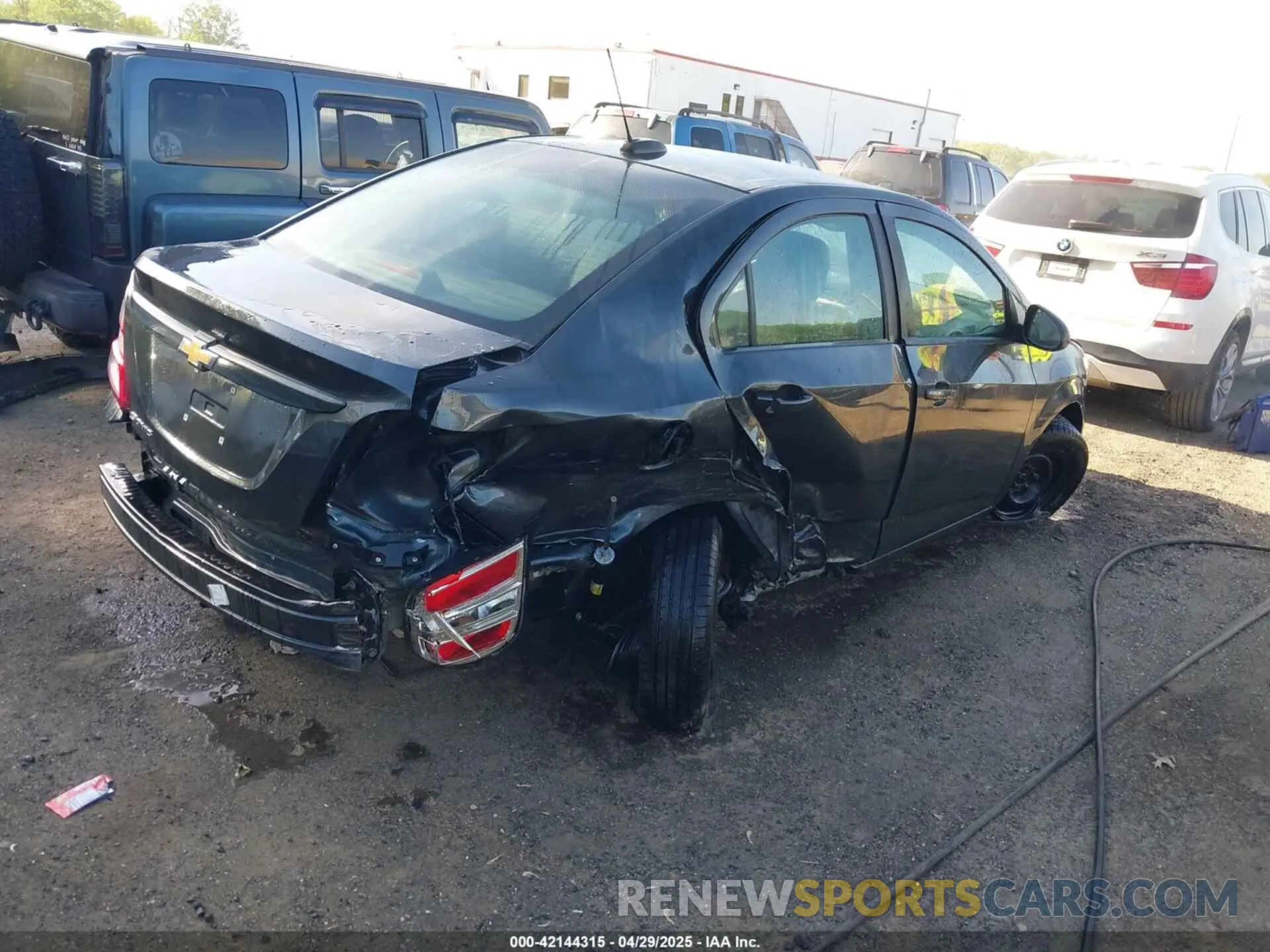 4 Photograph of a damaged car 1G1JB5SB4L4105835 CHEVROLET SONIC 2020
