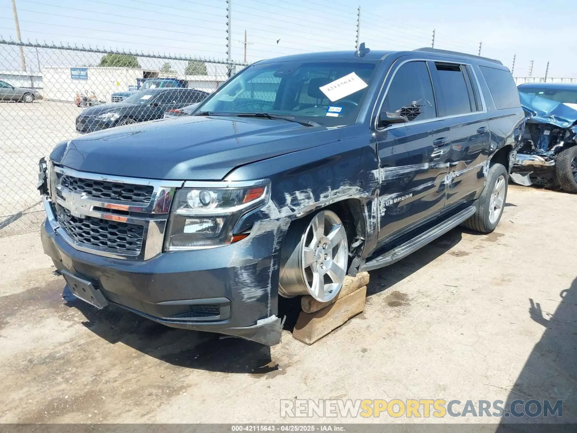 2 Photograph of a damaged car 1GNSCHKC8KR380930 CHEVROLET SUBURBAN 2019