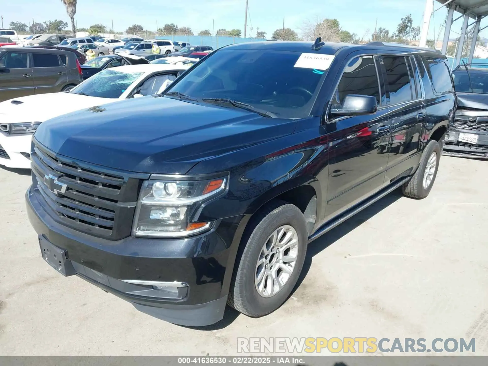 2 Photograph of a damaged car 1GNSCJKCXKR332739 CHEVROLET SUBURBAN 2019