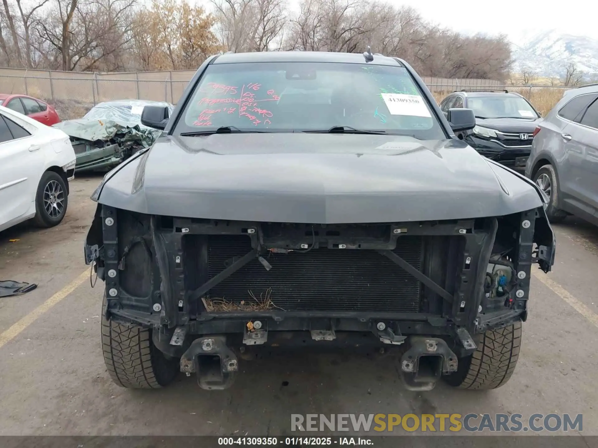 12 Photograph of a damaged car 1GNSKHKC0KR159583 CHEVROLET SUBURBAN 2019
