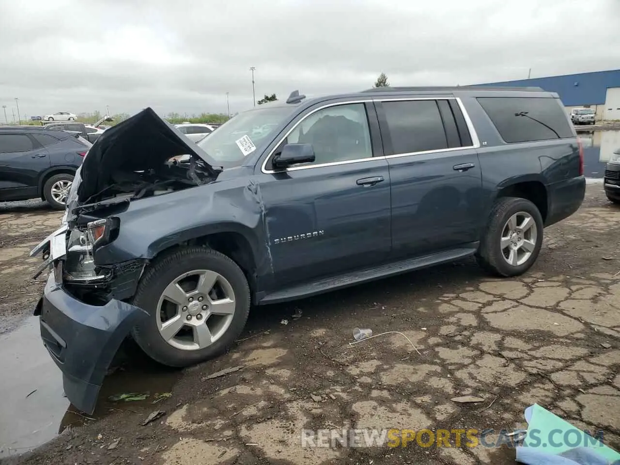 1 Photograph of a damaged car 1GNSKHKC2KR215247 CHEVROLET SUBURBAN 2019