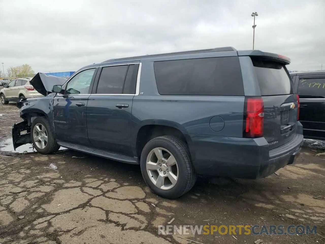 2 Photograph of a damaged car 1GNSKHKC2KR215247 CHEVROLET SUBURBAN 2019