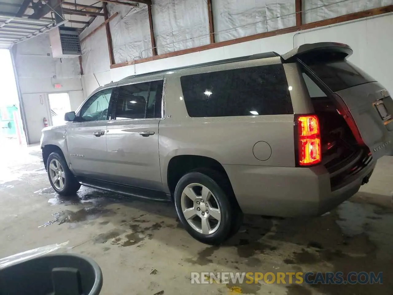 2 Photograph of a damaged car 1GNSKHKC2KR227348 CHEVROLET SUBURBAN 2019