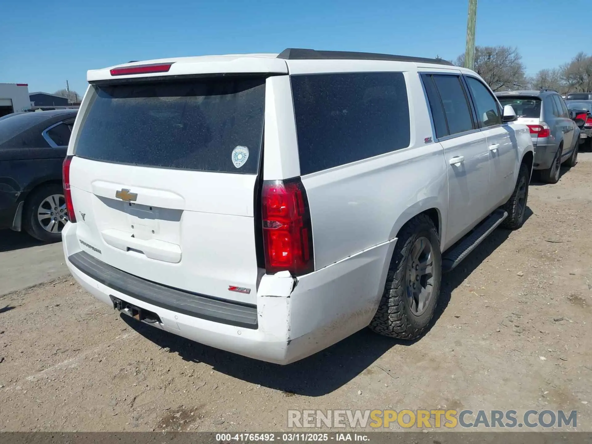 4 Photograph of a damaged car 1GNSKHKC2KR297254 CHEVROLET SUBURBAN 2019