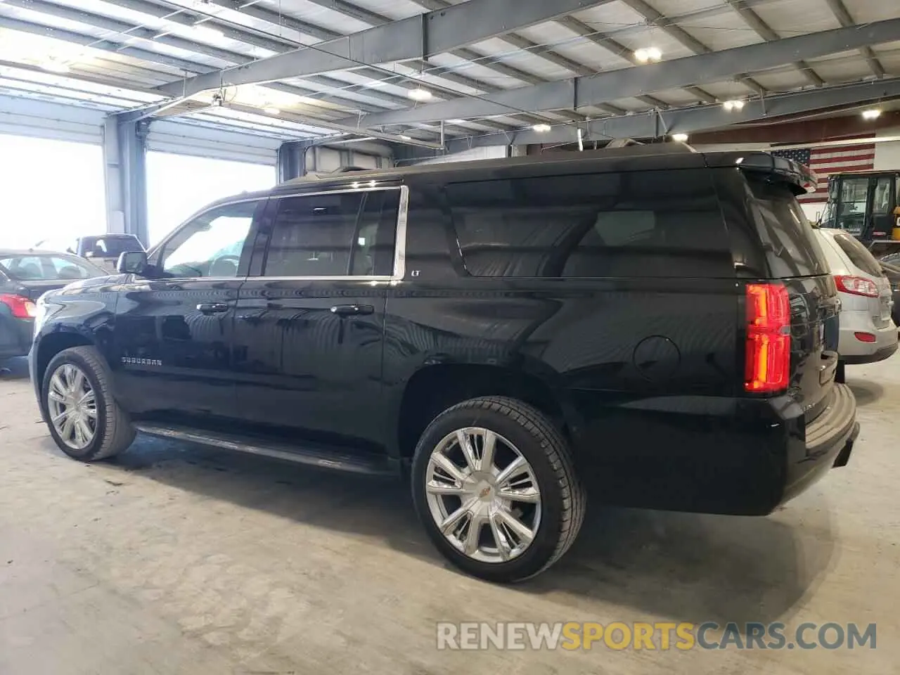 2 Photograph of a damaged car 1GNSKHKC2KR299019 CHEVROLET SUBURBAN 2019