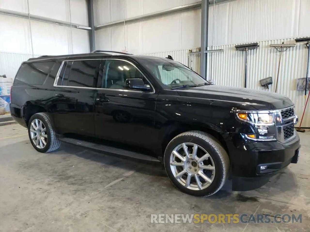 4 Photograph of a damaged car 1GNSKHKC2KR299019 CHEVROLET SUBURBAN 2019