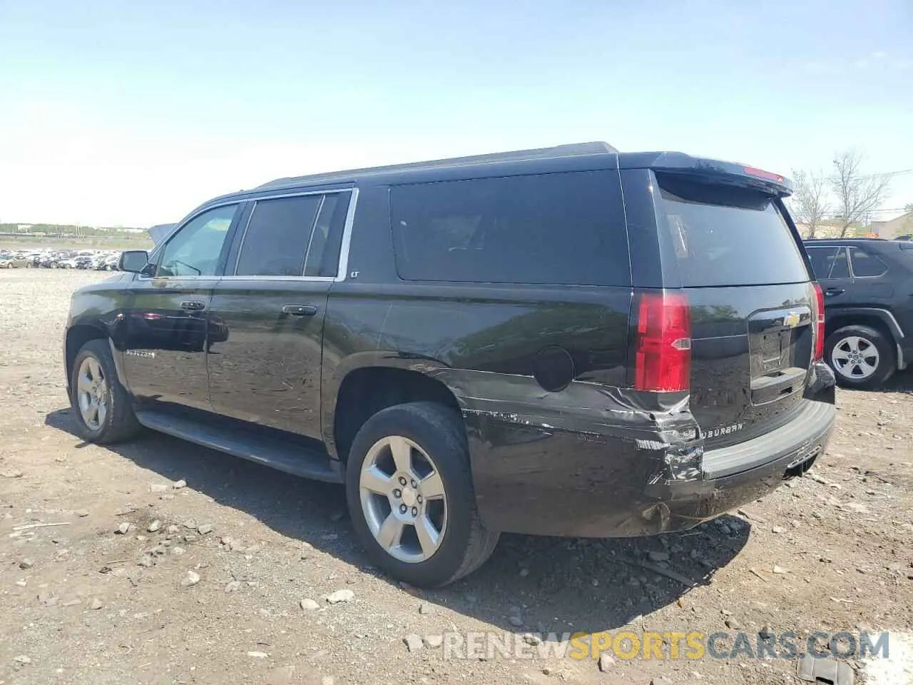 2 Photograph of a damaged car 1GNSKHKC3KR101791 CHEVROLET SUBURBAN 2019
