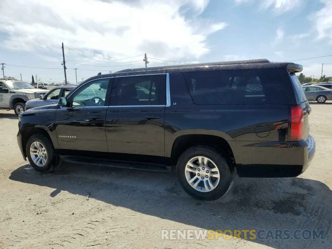 2 Photograph of a damaged car 1GNSKHKC3KR117263 CHEVROLET SUBURBAN 2019