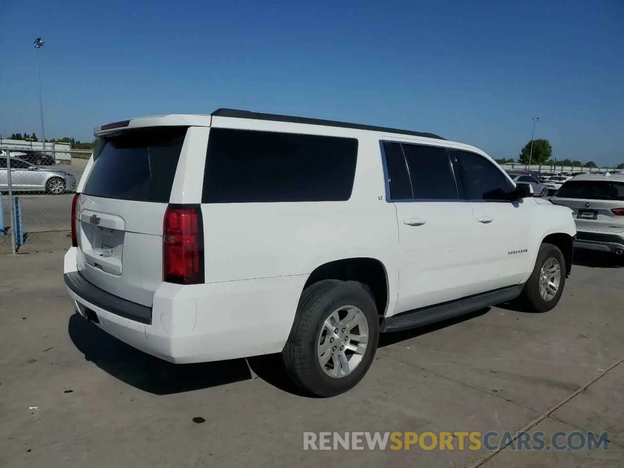 3 Photograph of a damaged car 1GNSKHKC4KR220093 CHEVROLET SUBURBAN 2019