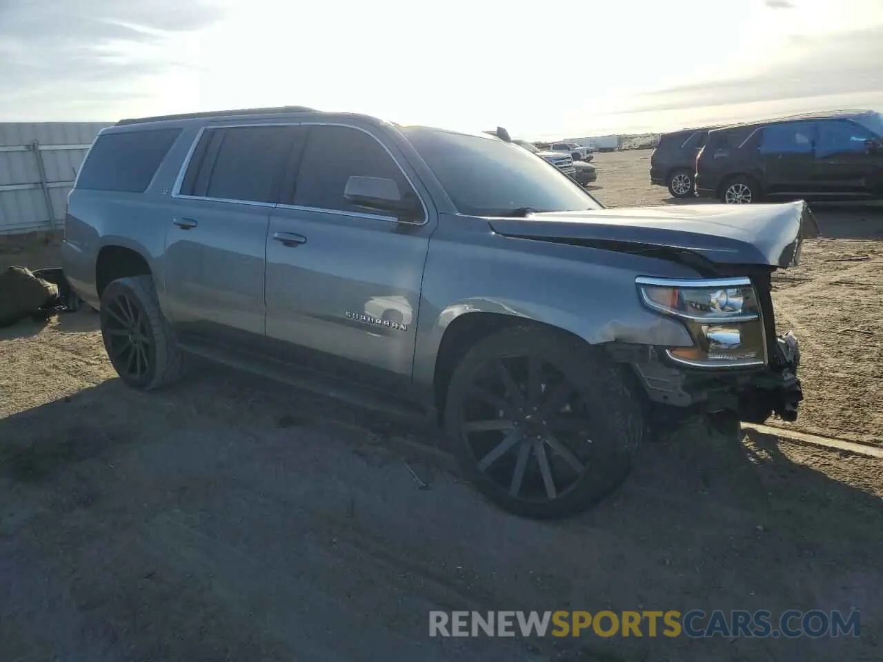 4 Photograph of a damaged car 1GNSKHKC5KR274499 CHEVROLET SUBURBAN 2019