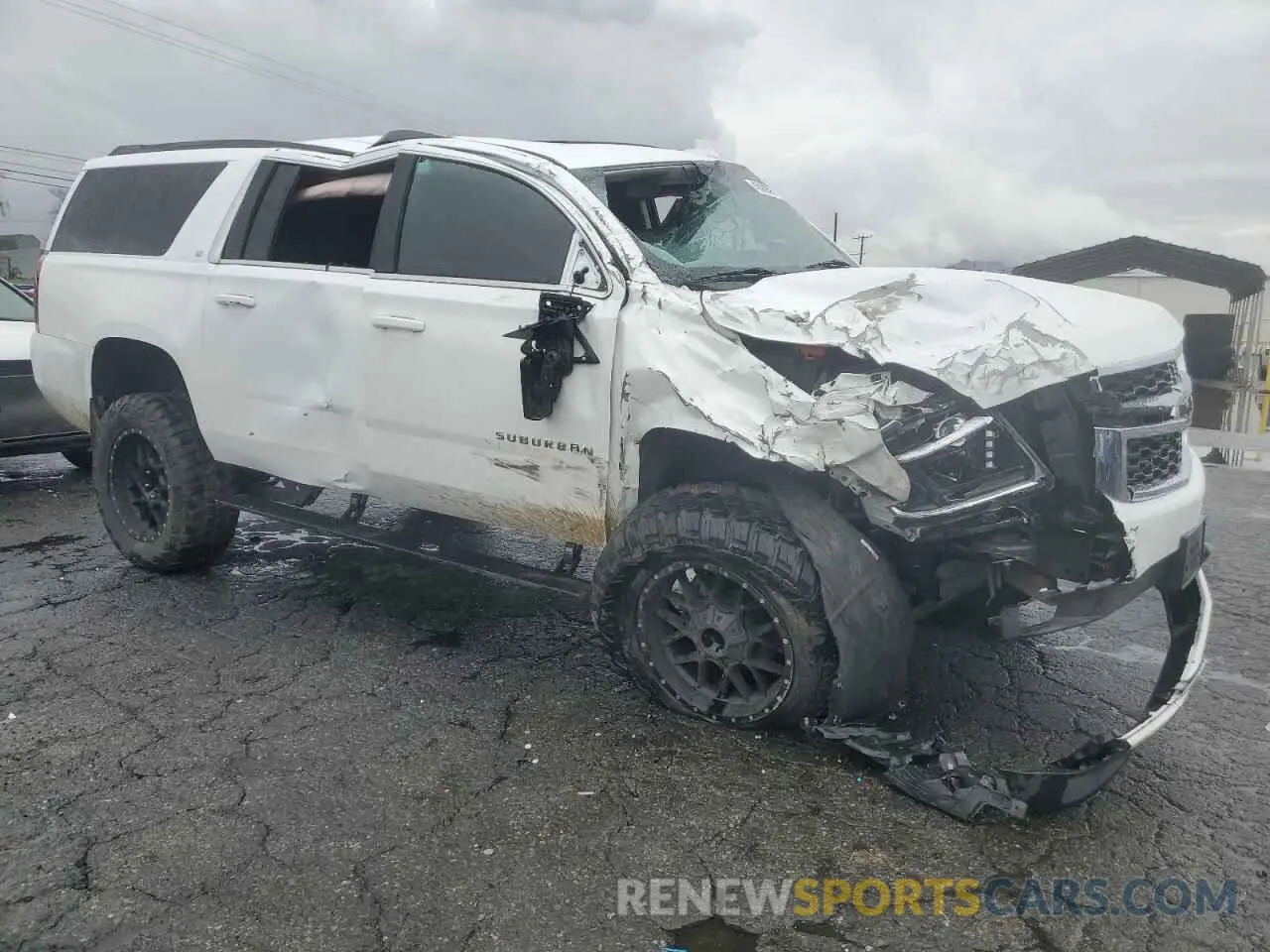 4 Photograph of a damaged car 1GNSKHKC5KR315150 CHEVROLET SUBURBAN 2019