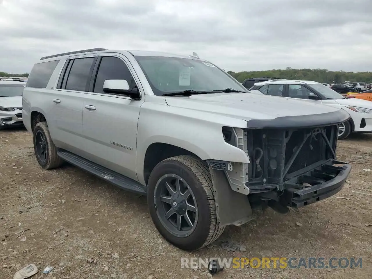 4 Photograph of a damaged car 1GNSKHKC5KR364798 CHEVROLET SUBURBAN 2019