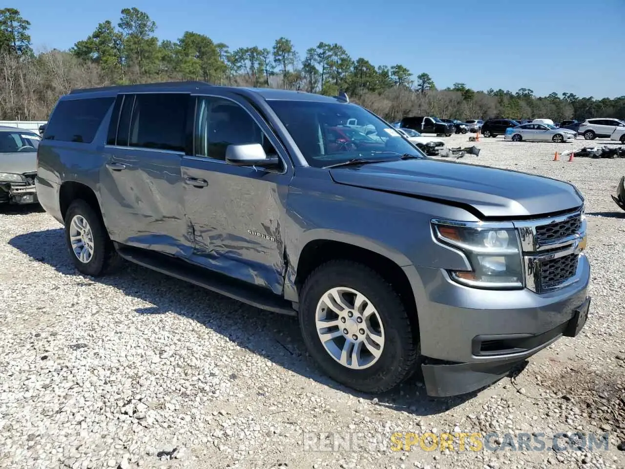 4 Photograph of a damaged car 1GNSKHKC7KR384860 CHEVROLET SUBURBAN 2019