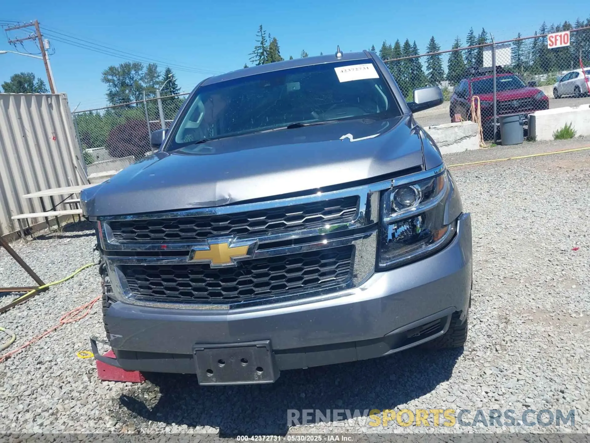 12 Photograph of a damaged car 1GNSKHKC9KR179184 CHEVROLET SUBURBAN 2019